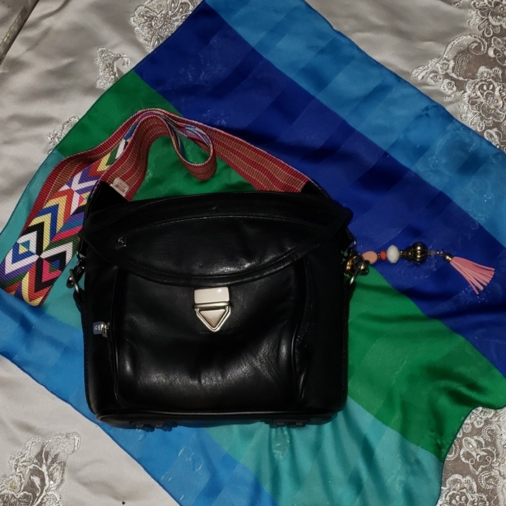 Leather camera bag converted to handbag